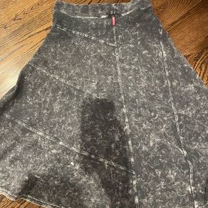 Black denim hard tail knee length skirt